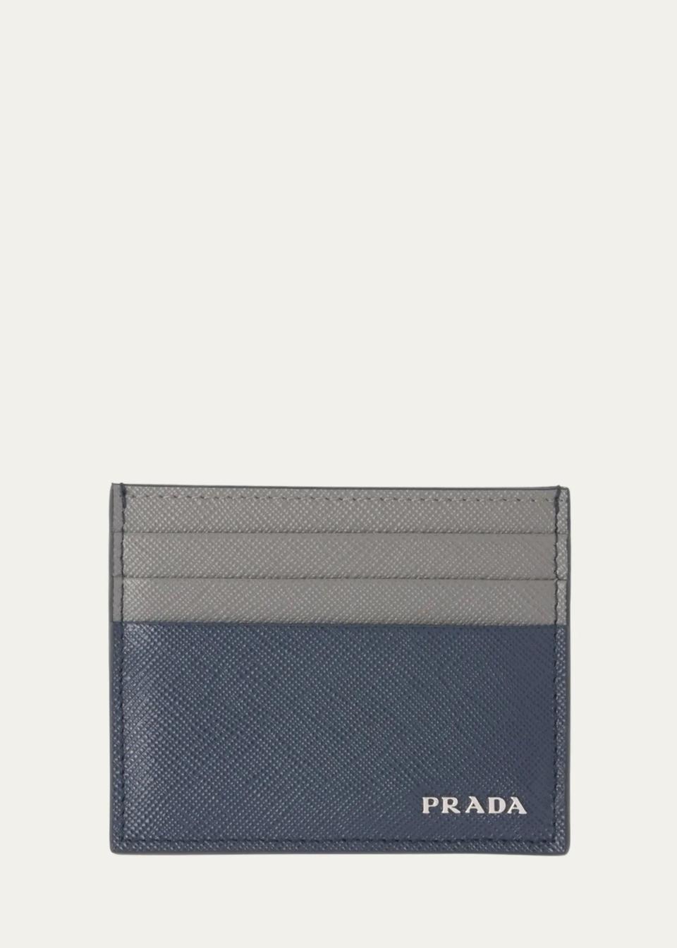 <p><a href="https://go.redirectingat.com?id=74968X1596630&url=https%3A%2F%2Fwww.bergdorfgoodman.com%2Fp%2Fprada-mens-bicolor-saffiano-leather-card-holder-prod181880005&sref=https%3A%2F%2Fwww.harpersbazaar.com%2Ffashion%2Ftrends%2Fg46067824%2Fbest-stocking-stuffers-for-men%2F" rel="nofollow noopener" target="_blank" data-ylk="slk:Shop Now;elm:context_link;itc:0;sec:content-canvas" class="link ">Shop Now</a></p><p>Bicolor Saffiano Leather Card Holder</p><p>bergdorfgoodman.com</p><p>$395.00</p><span class="copyright">bergdorfgoodman.com</span>