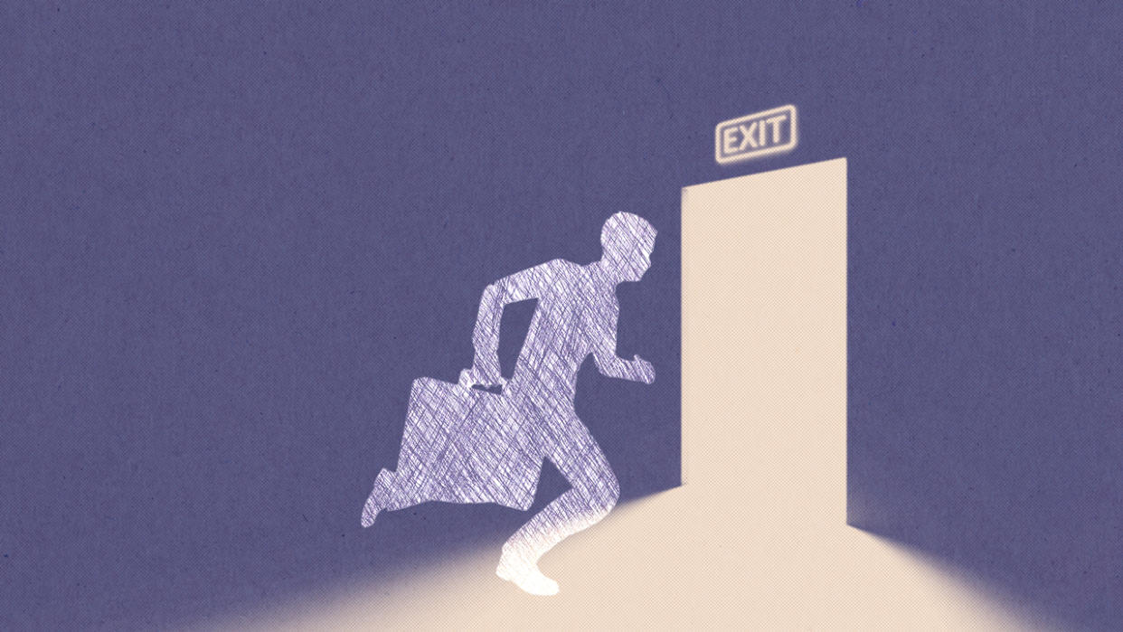 Silhouette of man with a briefcase running through an office exit door