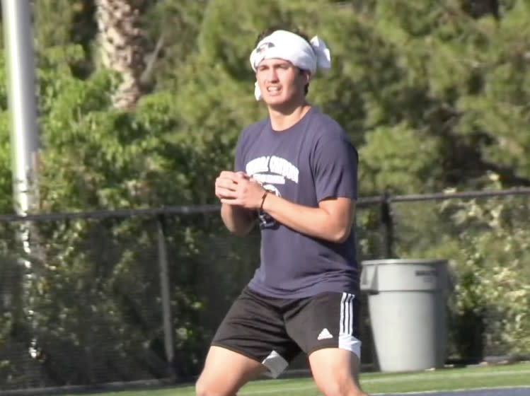 Quarterback Chayden Peery of Sierra Canyon practicing throwing without a ball last June when balls were not permitted.