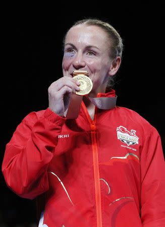 Boxing - Gold Coast 2018 Commonwealth Games - Women's 51kg - Victory Ceremony - Oxenford Studios - Gold Coast, Australia - April 14, 2018. Lisa Whiteside of England poses with her gold medal. REUTERS/Athit Perawongmetha