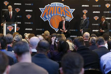 Phil Jackson (L) speaks during a news conference announcing him as the team president of the New York Knicks basketball team at Madison Square Garden in New York March 18, 2014.REUTERS/Shannon Stapleton