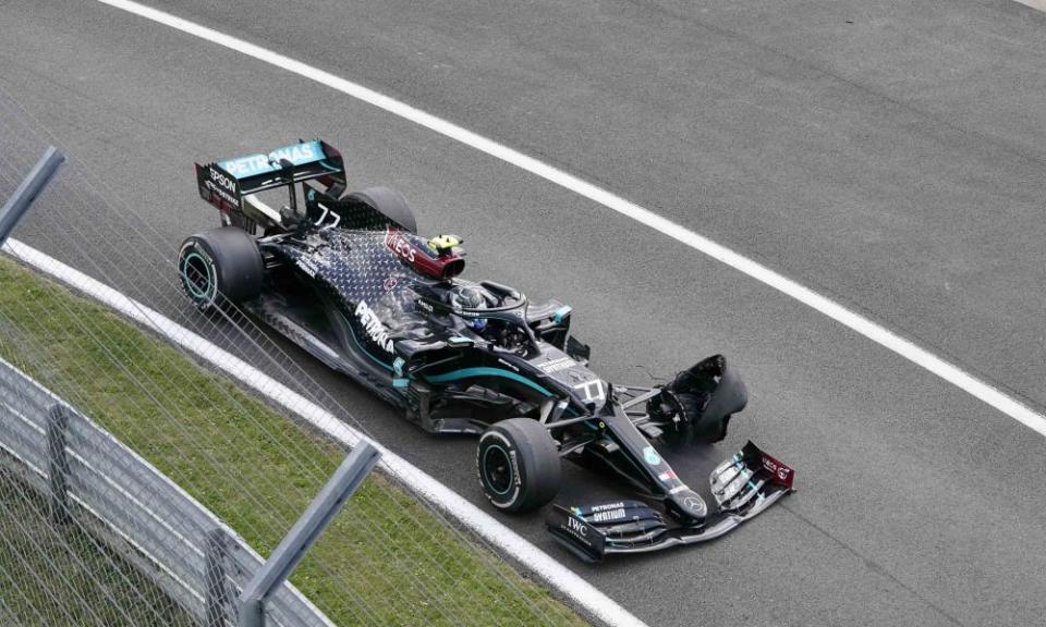 Valtteri Bottas is forced into the pit lane with two laps to go with a punctured front left tyre.