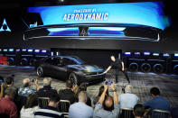 Tim Kuniskis, head of Dodge Brand talks about the Dodge Charger Daytona SRT concept that was unveiled, Wednesday, Aug. 17, 2022, in Pontiac, Mich. (AP Photo/Carlos Osorio)