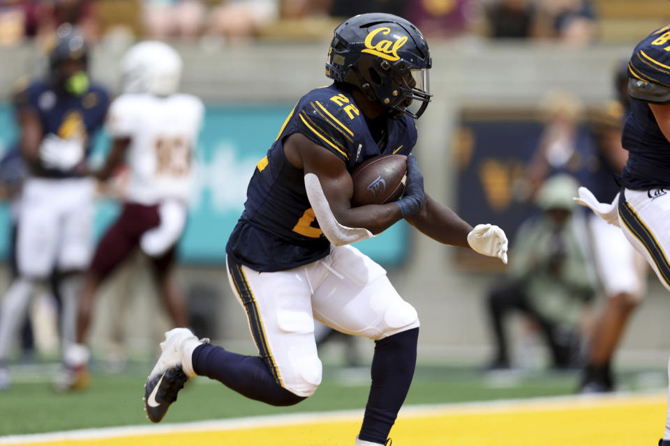 California running back Isaiah Ifanse (22) runs for a touchdown against Arizona State during the first half of an NCAA college football game in Berkeley, Calif., Saturday, Sept. 30, 2023. (AP Photo/Jed Jacobsohn)