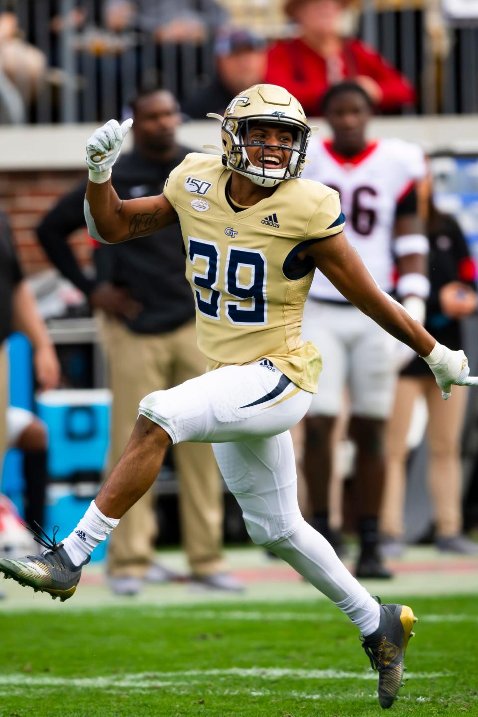 Georgia Tech defensive back Wesley Walker celebrates a fumble recovery on a punt return against Georgia during the first half of an NCAA college football game Saturday, Nov. 30, 2019 in Atlanta. (AP Photo/John Amis)