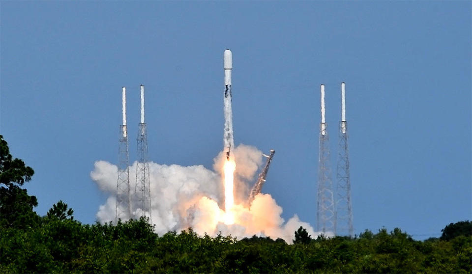 A SpaceX Falcon 9 rocket climbs toward orbit carrying a commercial Egyptian communications satellite. It was the California rocket builder's 23rd launch so far this year and its 157th overall. / Credit: William Harwood/CBS News