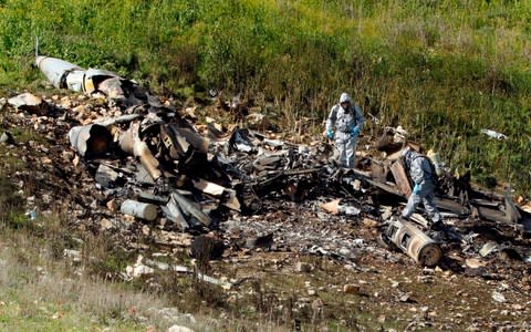 The remains of an Israel F-16 that crashed after coming under fire by Syrian air defences during attacks against "Iranian targets" - Credit: AFP