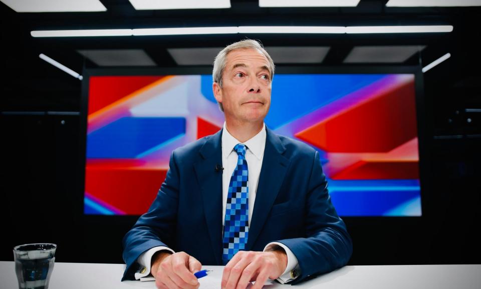 <span>Nigel Farage presenting his show on GB News.</span><span>Photograph: SOPA Images/LightRocket/Getty Images</span>