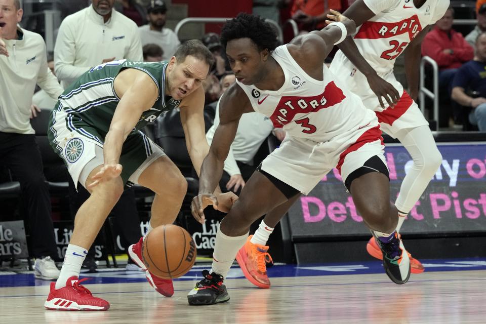 Raptors forward O.G. Anunoby reaches for a loose ball against the Pistons, Nov. 14, 2022, at Little Caesars Arena.