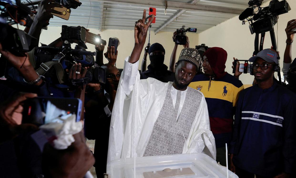 <span>Faye casting his vote in Mbour, Senegal. He has promised major change, including remapping Senegal’s relationship with France, its former colonial power.</span><span>Photograph: Zohra Bensemra/Reuters</span>