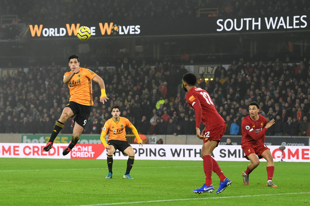 WOLVERHAMPTON, ENGLAND - JANUARY 23:  Raul Jimenez of Wolverhampton Wanderers scores his team's first goal during the Premier League match between Wolverhampton Wanderers and Liverpool FC at Molineux on January 23, 2020 in Wolverhampton, United Kingdom. (Photo by Michael Regan/Getty Images)