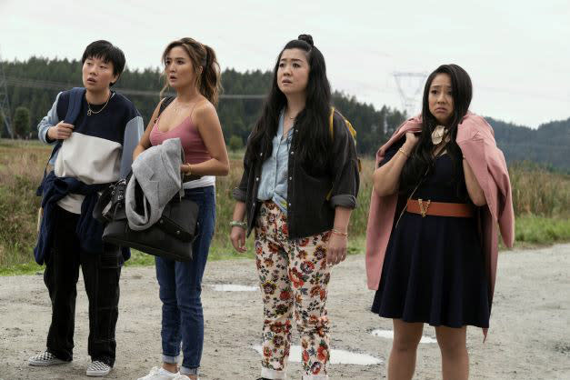 Four women look upset at something offscreen. They are carrying backpacks. (Courtesy of Lionsgate)