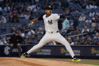 New York Yankees pitcher Marcus Stroman throws during the first inning of the team's baseball game against the Miami Marlins, Wednesday, April 10, 2024, in New York. (AP Photo/Peter K. Afriyie)