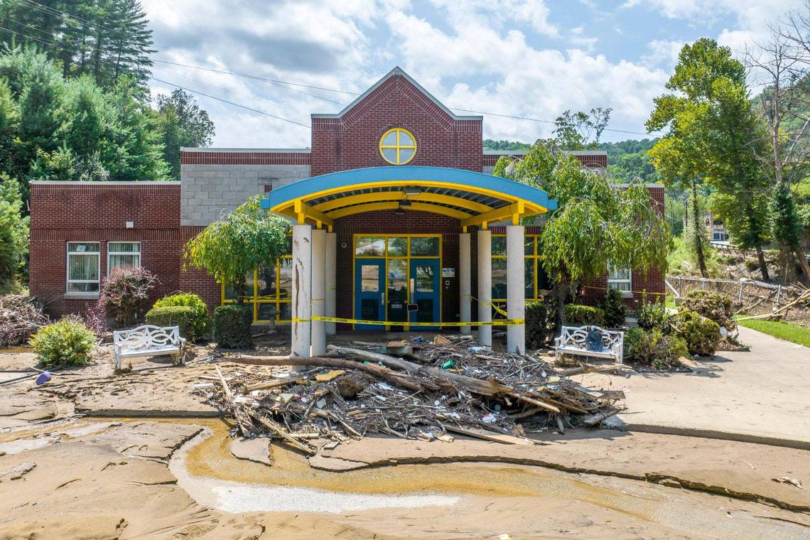 Debris and mud surround the entrance to Robinson Elementary School near Ary in Perry County, Ky., on Tuesday, Aug. 2, 2022. Flood waters devastated many communities in Eastern Kentucky last week.