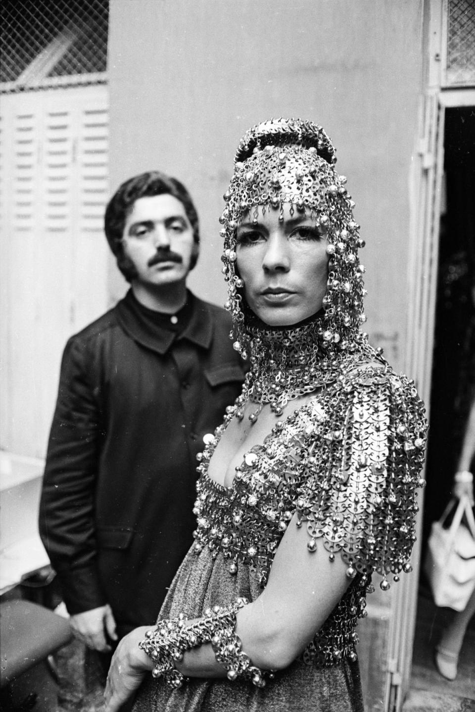 Spanish fashion designer Paco Rabanne with model Isabel Feldel, who is wearing one of his elaborate metallic creations in 1967 (Getty Images)