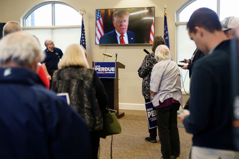 FILE PHOTO: Former Republican U.S. Senator David Perdue campaigns for Governor in Covington
