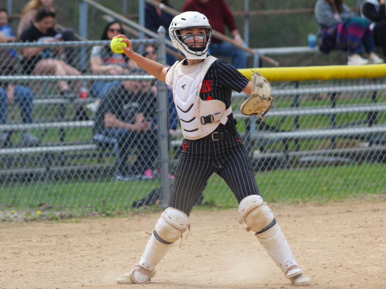 Taunton's Aniyah Bailey makes a throw to first during a non-league game against Westfield.