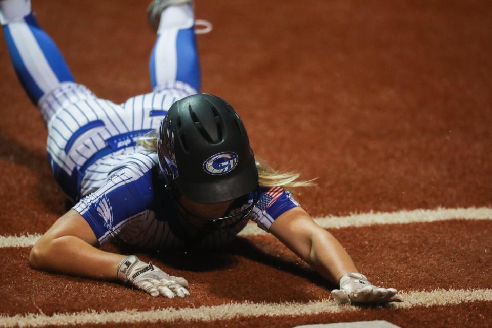 Georgetown's Ashley Blaylock (1) slides into home plate and scores a go ahead run in a regional final game against Flour Bluff on Friday, May 27, 2022 at Jourdanton High School. The Eagles won 6-5.