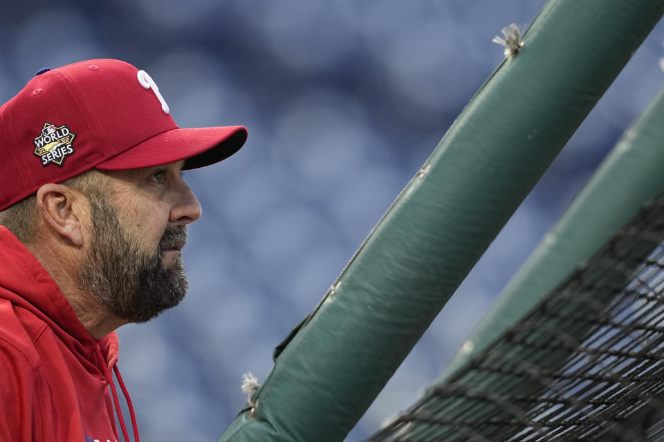 Philadelphia Phillies hitting coach Kevin Long watches during batting practice before Game 4 of baseball's World Series between the Houston Astros and the Philadelphia Phillies on Wednesday, Nov. 2, 2022, in Philadelphia. (AP Photo/David J. Phillip)