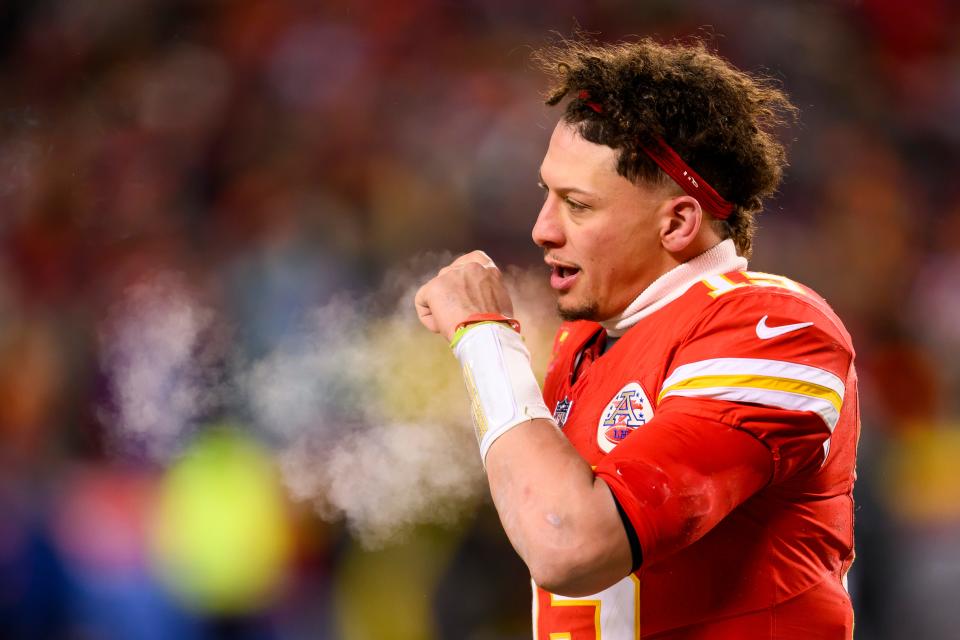 Kansas City Chiefs quarterback Patrick Mahomes comes off the field after needing his helmet replaced during the second half of an NFL wild-card playoff football game against the Miami Dolphins, Saturday, Jan. 13, 2024 in Kansas City, Mo. (AP Photo/Reed Hoffmann) ORG XMIT: NYOTK