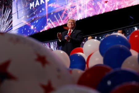 Republican U.S. presidential nominee Donald Trump celebrates at the conclusion of the final session of the Republican National Convention in Cleveland, Ohio, U.S. July 21, 2016. REUTERS/Jonathan Ernst