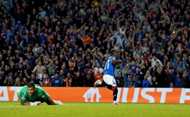 Rabbi Matondo, right, wheels away in celebration after scoring Rangers' second goal