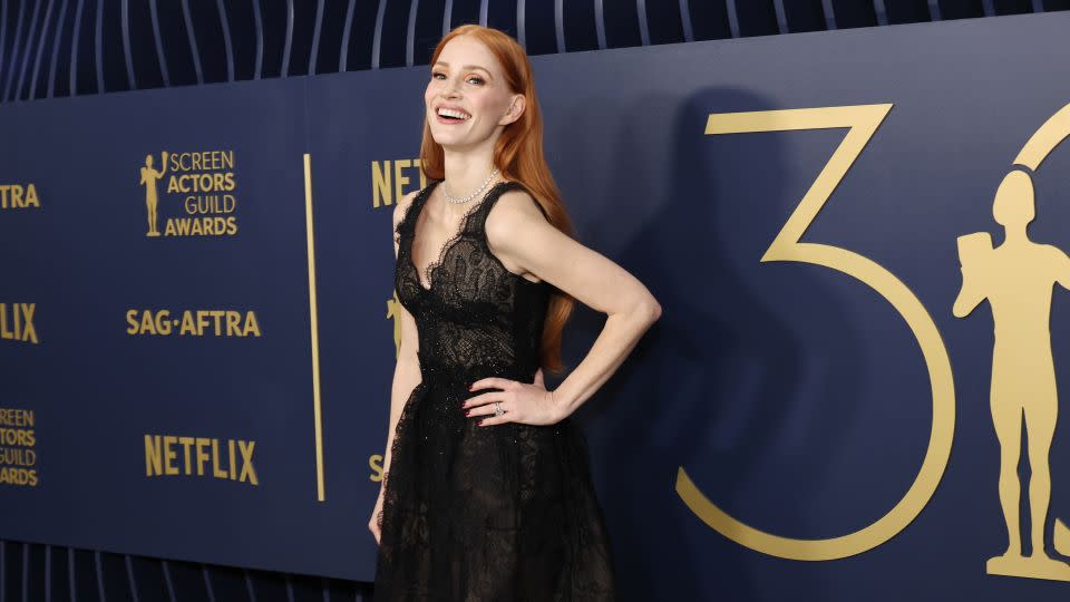 Jessica Chastain in lacy black Armani Privé. - Amy Sussman/WireImage/Getty Images