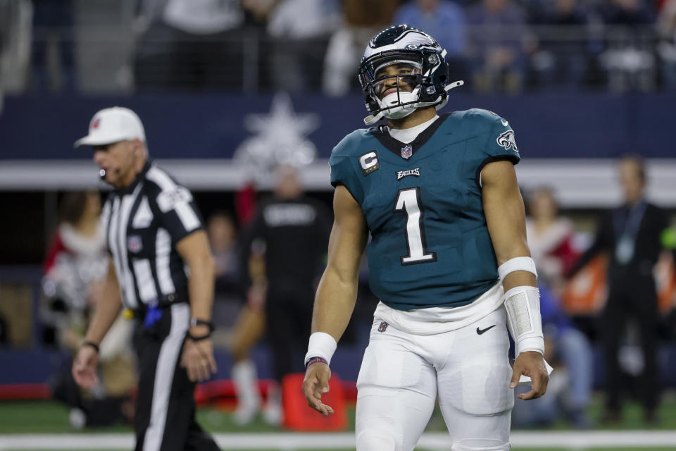 Philadelphia Eagles quarterback Jalen Hurts reacts after an incomplete pass on a third-down play against the Dallas Cowboys during the second half of an NFL football game, Sunday, Dec. 10, 2023, in Arlington, Texas. (AP Photo/Michael Ainsworth)