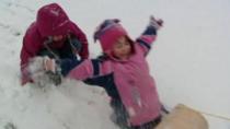 Storm days can be fun for children, but a financial problem for some parents.