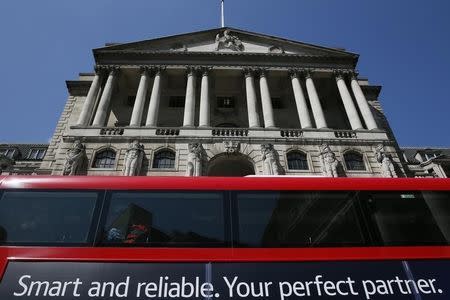 A bus passes the Bank of England in London, Britain May 13, 2015. REUTERS/Stefan Wermuth