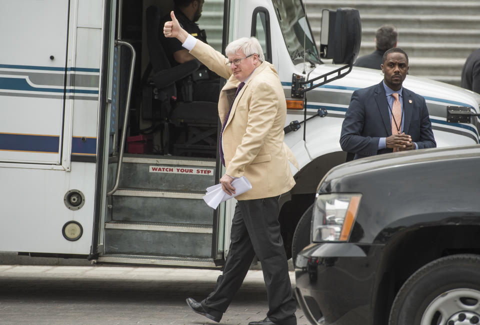 Rep. Glenn Grothman (R-Wis.) gives a thumbs-up to protesters on the East Front of the Capitol after the House passed the Republicans' bill to repeal and replace the Affordable Care Act on May 4, 2017. The protesters support the ACA.