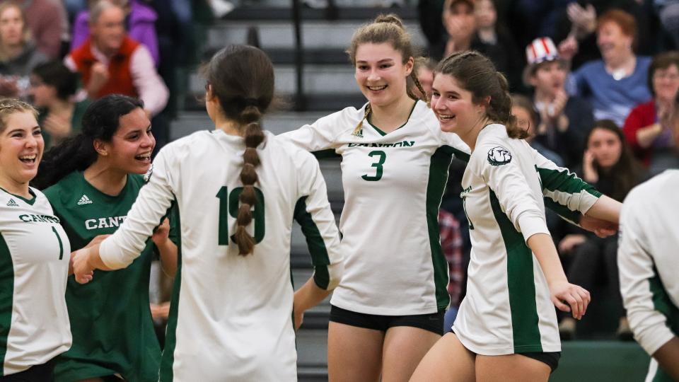 Canton's Jessica Wright, center, celebrates with teammates during a game against Notre Dame Academy in the Division 2 Sweet Sixteen on Tuesday, Nov. 7, 2023.