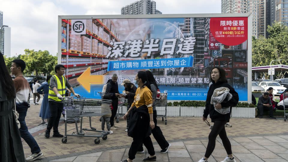 A billboard ad outside a Sam's Club store in Shenzhen appealing to Hong Kong customers by promoting its same-day delivery service. - Qilai Shen/Bloomberg/Getty Images