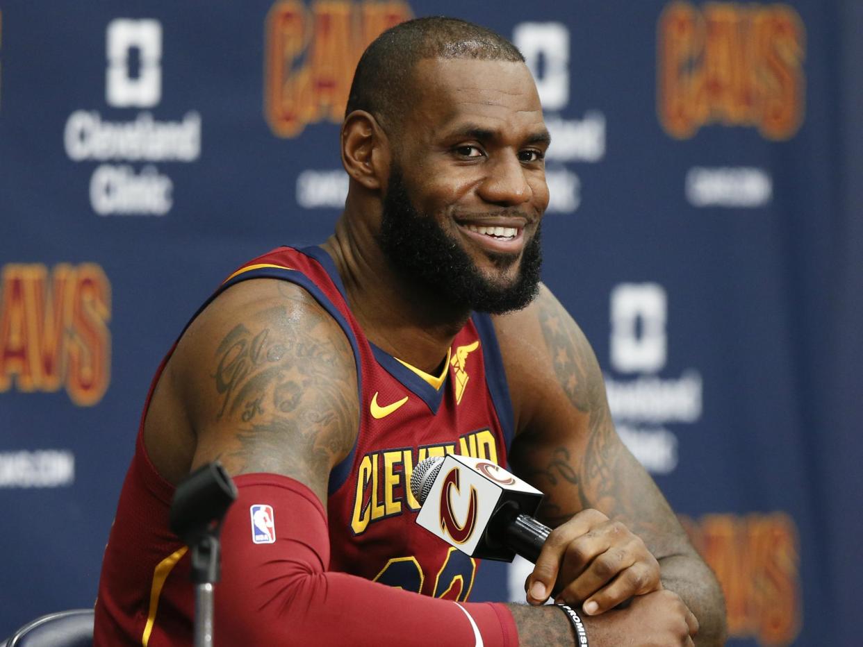 Cleveland Cavaliers' LeBron James answers questions during the NBA basketball team media day on 25 September in Ohio: AP Photo/Ron Schwane