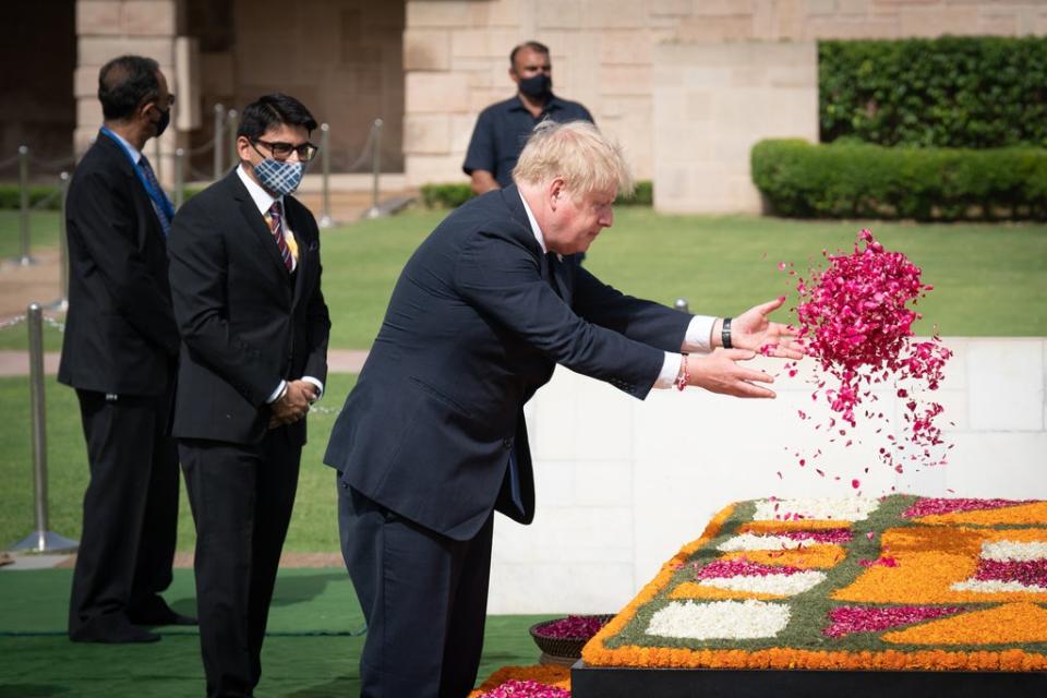 Mr Johnson earlier attended Gandhi’s memorial at Raj Ghat in New Delhi where he laid a wreath in tribute to the late Indian leader (Stefan Rousseau) (PA Wire)