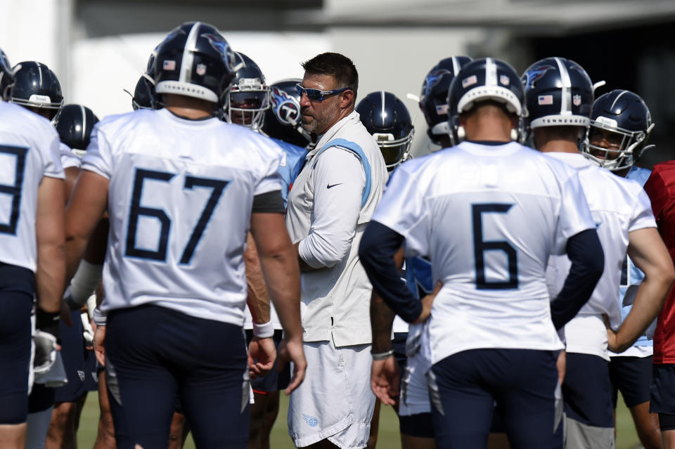 Tennessee Titans head coach Mike Vrabel talks to his players during NFL football training camp Friday, July 30, 2021, in Nashville, Tenn. (AP Photo/Mark Zaleski)