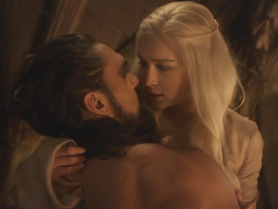 Jason Momoa and Emilia Clarke in the controversial rape scene in the first season of ‘Game of Thrones' (HBO)
