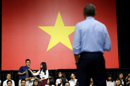 U.S. President Barack Obama listens to a question from the audience as he attends a town hall meeting with members of the Young Southeast Asian Leaders Initiative (YSEALI) at the GEM Center in Ho Chi Minh City, Vietnam May 25, 2016. REUTERS/Carlos Barria