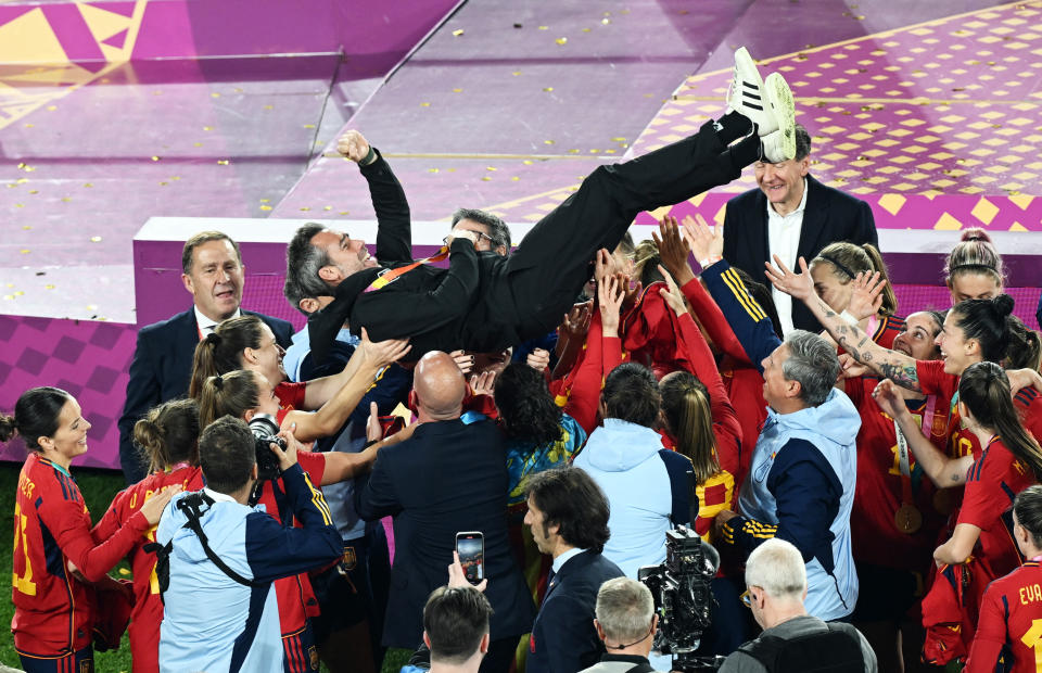 Soccer Football - FIFA Women's World Cup Australia and New Zealand 2023 - Final - Spain v England - Stadium Australia, Sydney, Australia - August 20, 2023 Spain coach Jorge Vilda celebrates with the team after winning the World Cup final REUTERS/Jaimi Joy