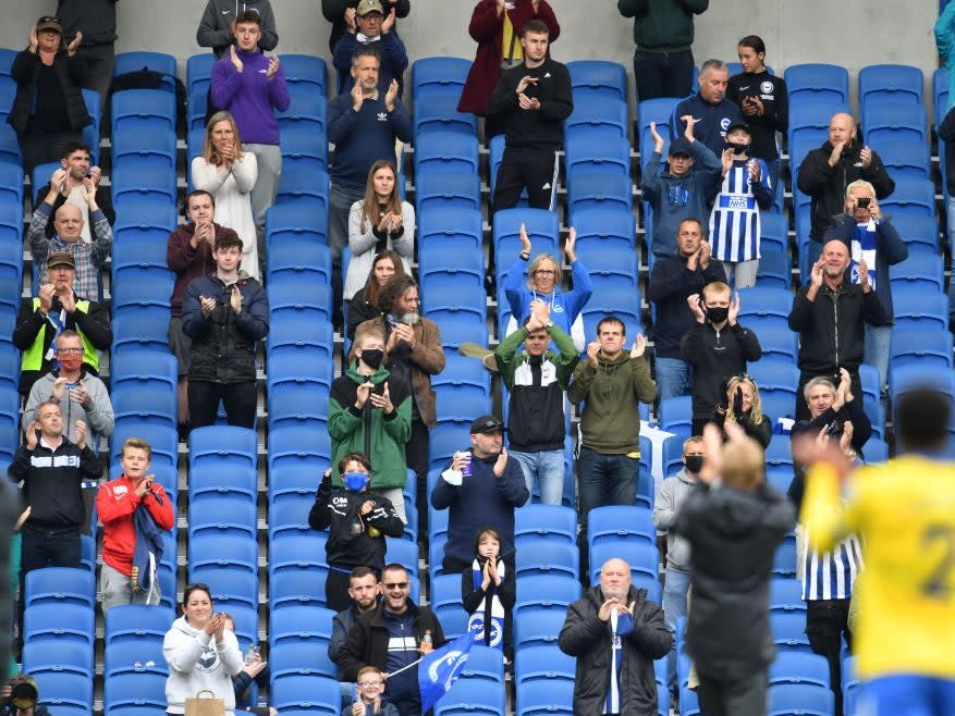 Socially distanced fans at the Brighton vs Chelsea friendly (AFP via Getty)