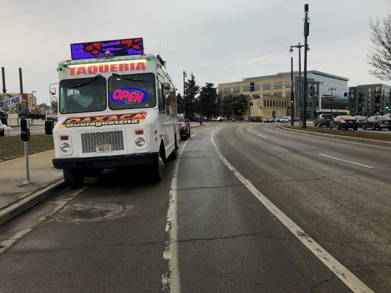 Oaxaca Taqueria food truck is parked on the corner of North Water and East Knapp streets, where the Milwaukee Common Council's health and safety committee is proposing to ban food trucks.