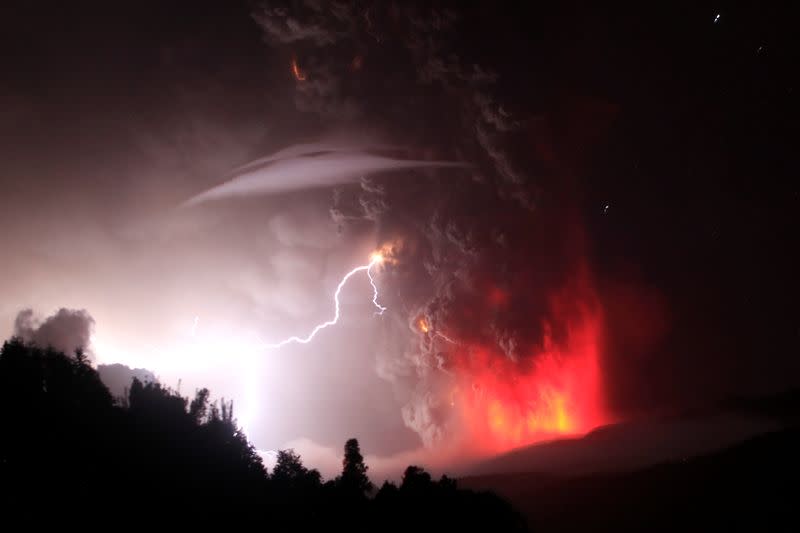 FILE PHOTO: Lightning bolts strike around the Puyehue-Cordon Caulle volcanic chain near southern Osorno city