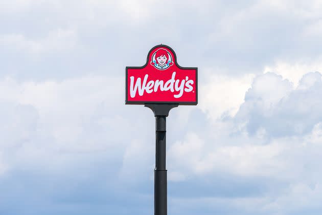 The Wendy's logo sign is seen above a restaurant on Aug. 18, 2022. (Photo: Paul Weaver/SOPA Images/LightRocket via Getty Images)