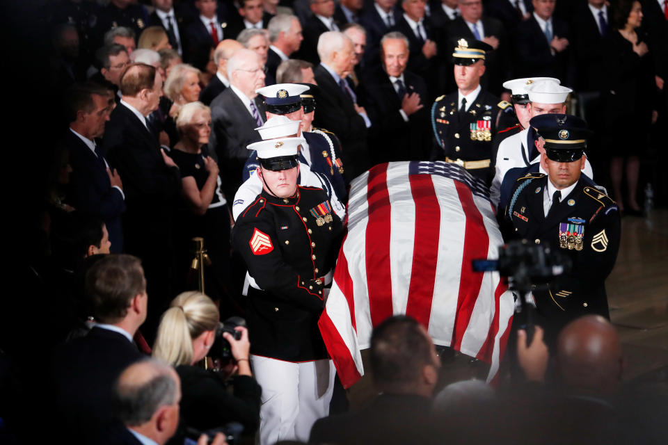 <p>An Honor Guard places the casket containing the body of late Sen. John McCain to lie in state inside the U.S. Capitol Rotunda in Washington, Aug. 31, 2018. (Photo: Eric Thayer/Reuters) </p>