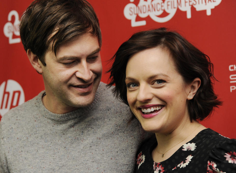 Mark Duplass, left, and Elisabeth Moss, cast members in "The One I Love," pose together at the premiere of the film at the 2014 Sundance Film Festival, Tuesday, Jan. 21, 2014, in Park City, Utah. (Photo by Chris Pizzello/Invision/AP)