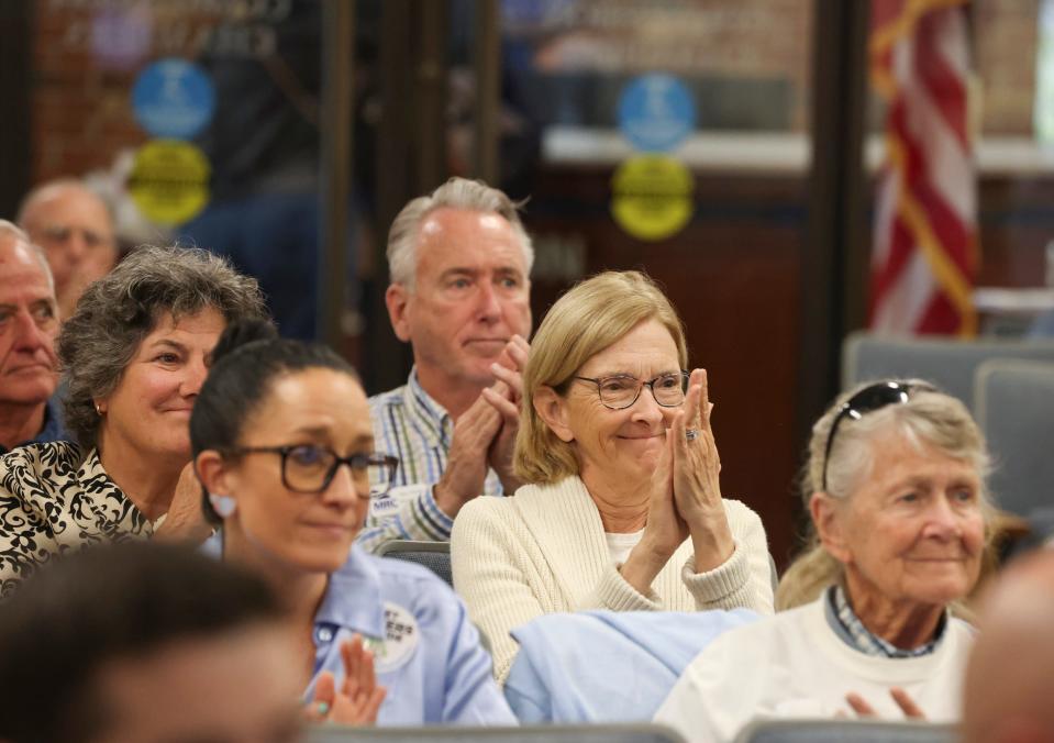 The crowd claps after Martin County commissioners voted 4-0 to put a land conservation sales tax referendum on the November ballot, Tuesday, Feb. 20, 2024, at 2401 S.E. Monterey Rd. in Stuart. The tax is expected to raise over $18 million a year to buy land. The half-cent tax would raise the county's sales tax to 7 percent and is backed by the conservation group Martin County Forever.