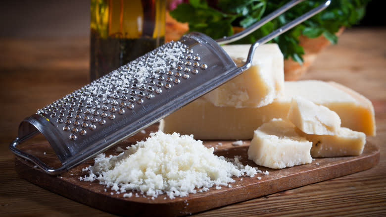 Parmesan cheese with grater