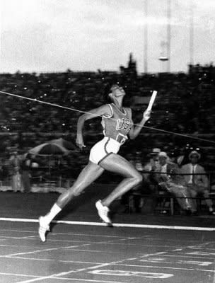 USA's Wilma Rudolph, Clarksville, Tenn., hits the tape to win the gold medal in the women's 4 x 100-meter relay at the Summer Olympics in Rome, Sept. 8, 1960.