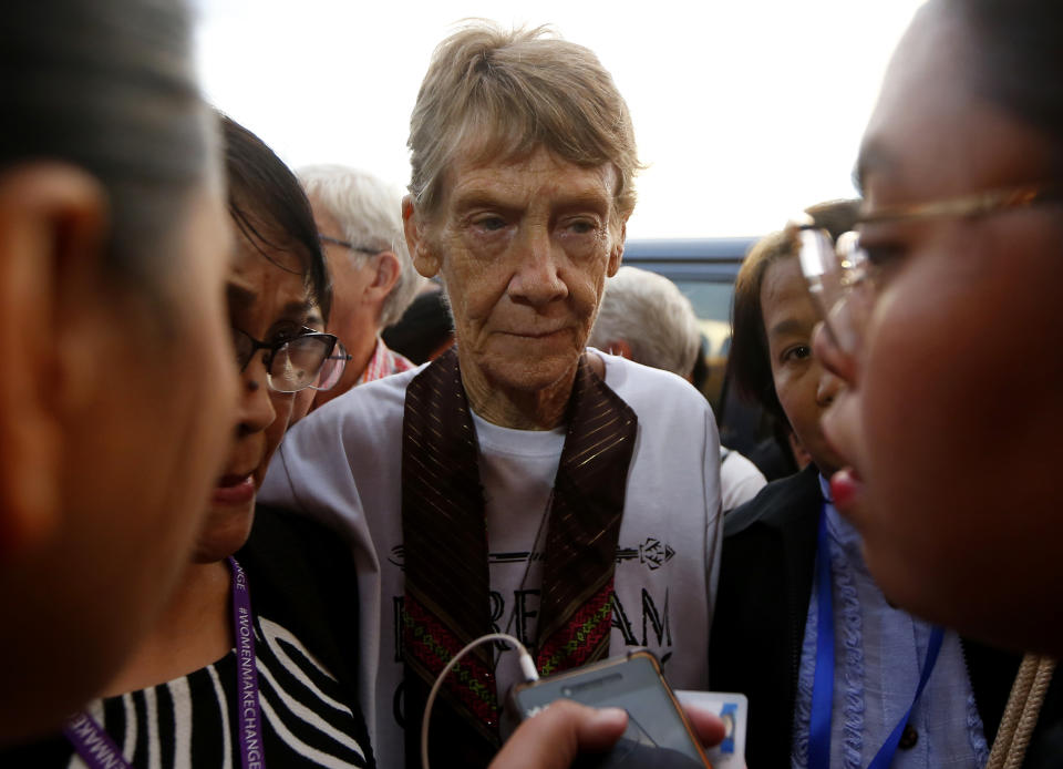 An emotional Australian Roman Catholic nun Sister Patricia Fox listens to her lawyers prior to being escorted to the Ninoy Aquino International Airport for her flight to Australia Saturday, Nov. 3, 2018, in Manila, Philippines. Sister Fox decided to leave after 27 years in the country after the Immigration Bureau denied her application for the extension of her visa. Sr. Fox called on Filipinos to unite and fight human rights abuses ahead of her forced departure from the country. (AP Photo/Bullit Marquez)