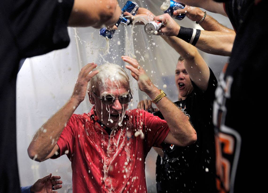 Fresno Grizzlies president Chris Cummings, center, has beer poured over him in the locker room as the Grizzlies celebrate their 7-3 and PCL Championship win against Round Rock Sunday, September 20, 2015 in Fresno, Calif. The Grizzlies won the PCL championship 7-3.